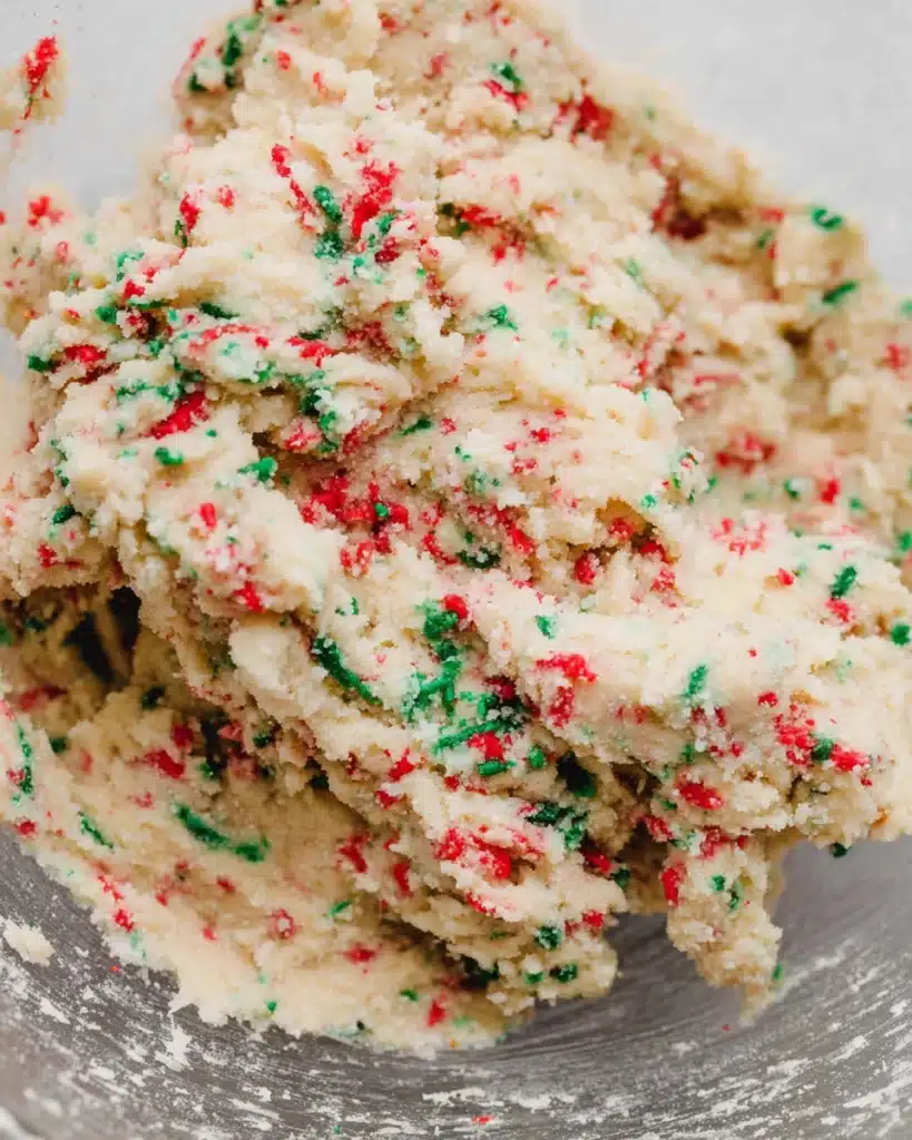 Christmas Sprinkle Cookies 4 Fresh Christmas sprinkle cookie dough in mixing bowl