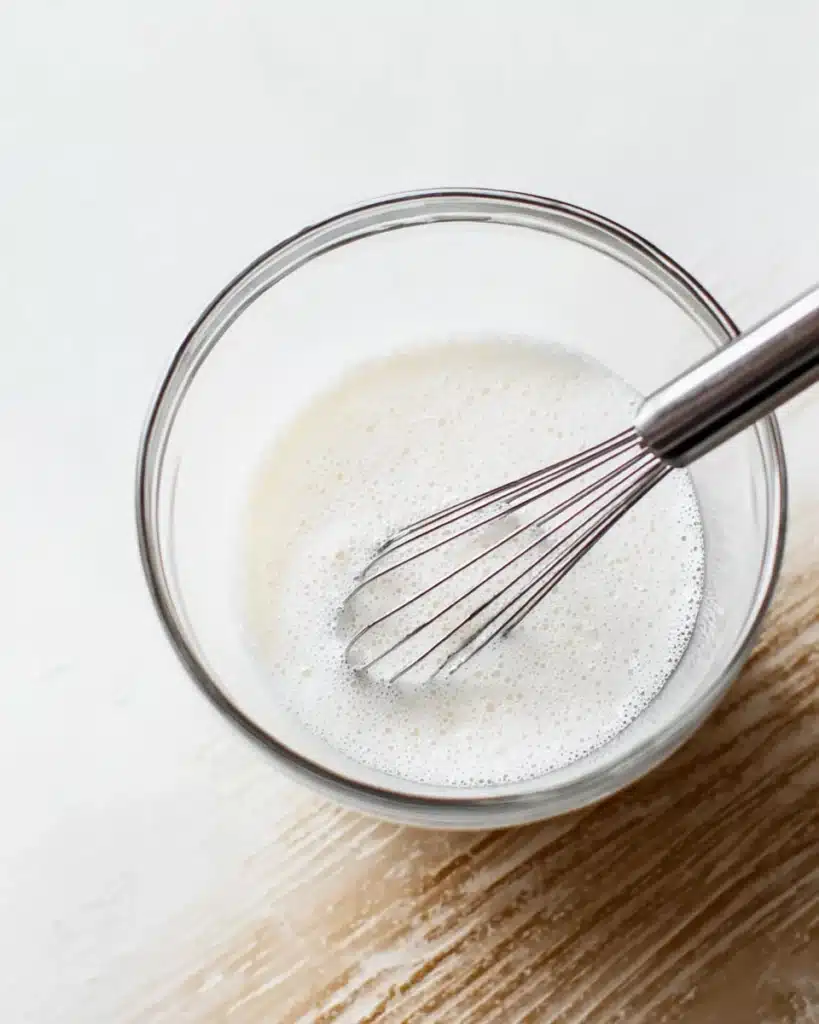 Healthy Pumpkin Pancakes 2 Whisking milk and yogurt for healthy pumpkin pancakes