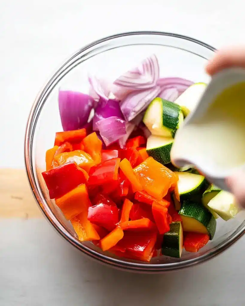 Air Fryer Chicken Sausage and Veggies: Quick, Flavorful, and Healthy Dinner 3 Fresh chopped veggies with oil for Air Fryer Chicken Sausage and Veggies