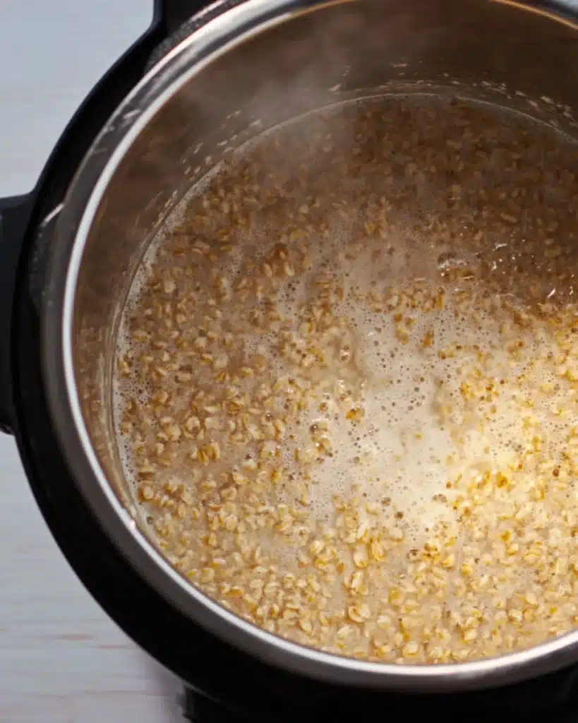 Cooked steel cut oats after natural pressure release in an Instant Pot