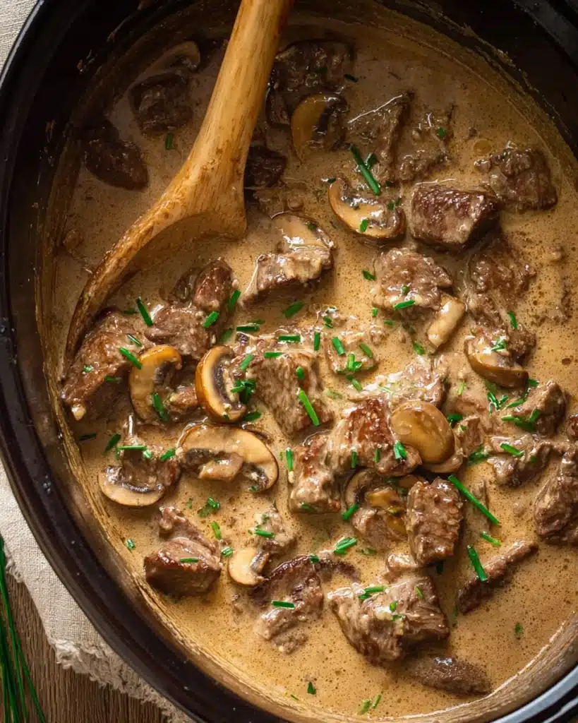 Slow Cooker Beef Stroganoff Stew 6 Creamy slow cooker beef stroganoff stew with mushrooms and chives