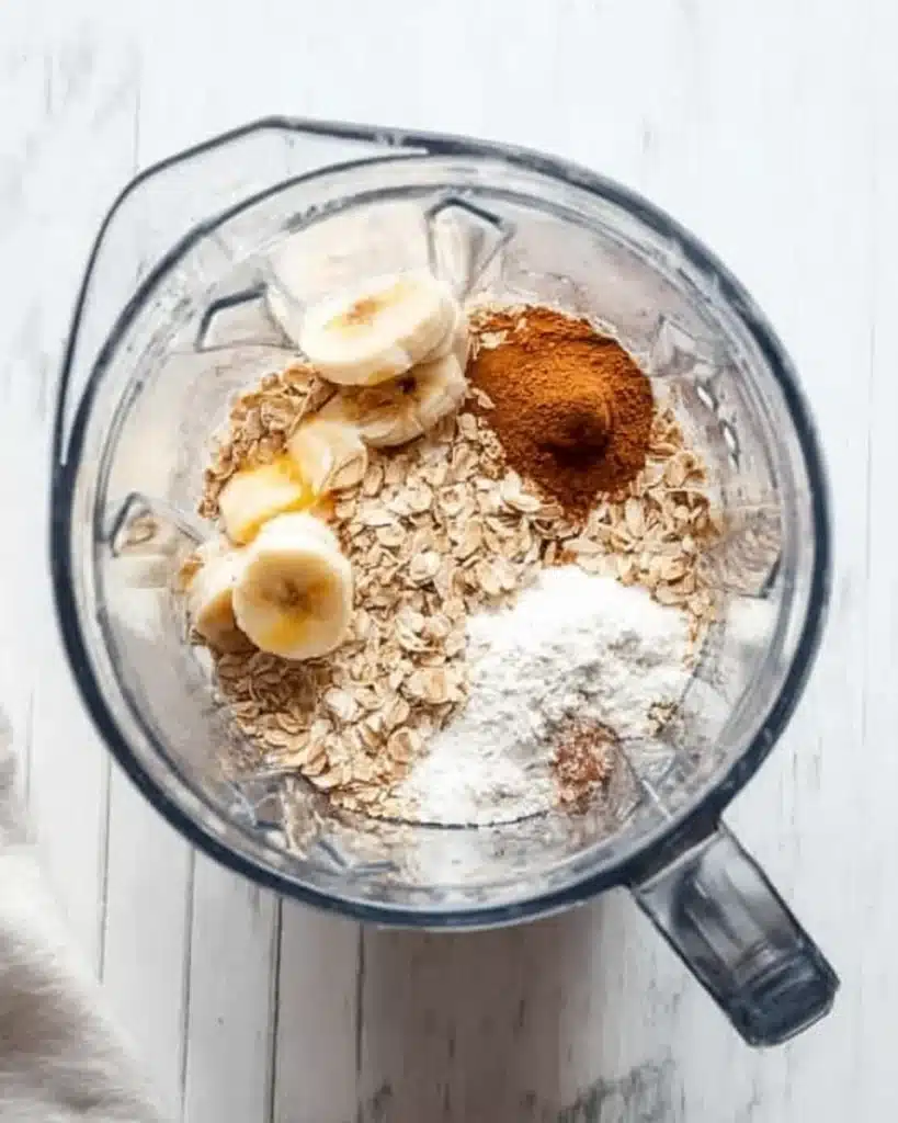 Banana Oat Muffins 3 Banana oat muffin ingredients in blender ready to blend