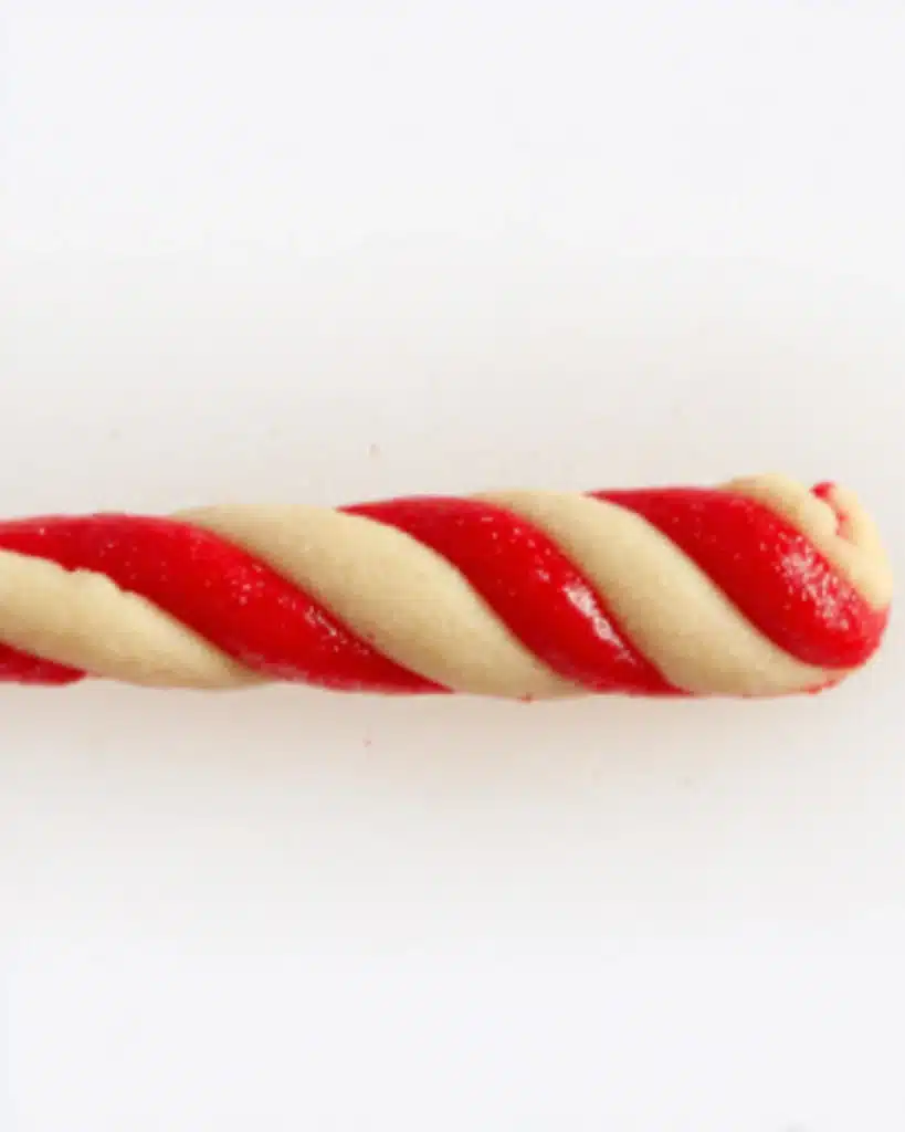 Red and white twisted cookie dough rope for Christmas Candy Cane Cookies