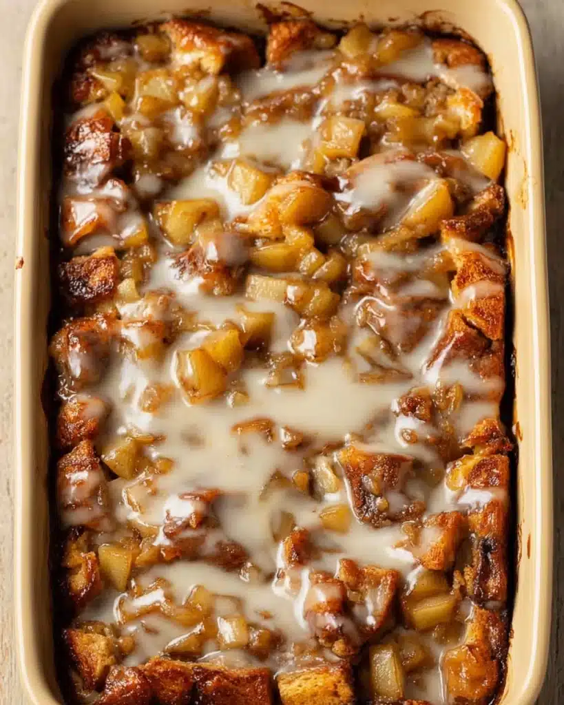 Cinnamon Rolls and Apple Pie Filling 1 Warm cinnamon roll apple bake topped with vanilla icing in a ceramic dish