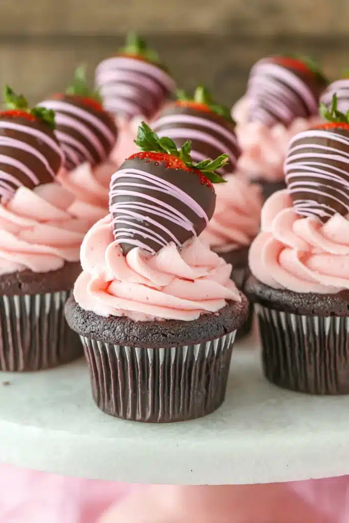 Chocolate Covered Strawberry Cupcakes 1 Chocolate Covered Strawberry Cupcakes frosting and chocolate-dipped strawberry topping