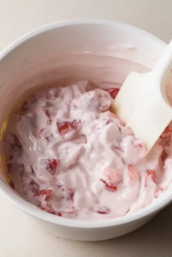 Chocolate Strawberry Yogurt Clusters (Healthy, Easy, No-Bake Snack!) 3 Mixing bowl of creamy strawberry yogurt for chocolate strawberry yogurt clusters