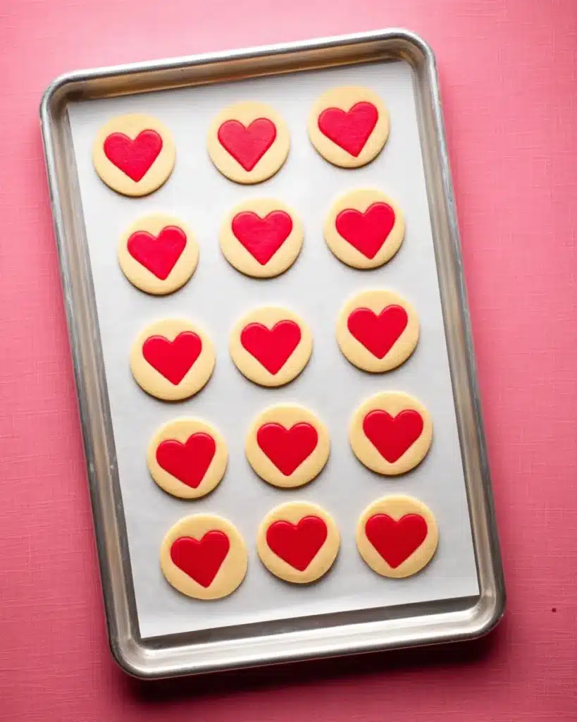 Heart Cookies – Sweet Valentine’s Day Slice-and-Bake Treat 5 Heart Cookies sliced and ready to bake on baking sheet
