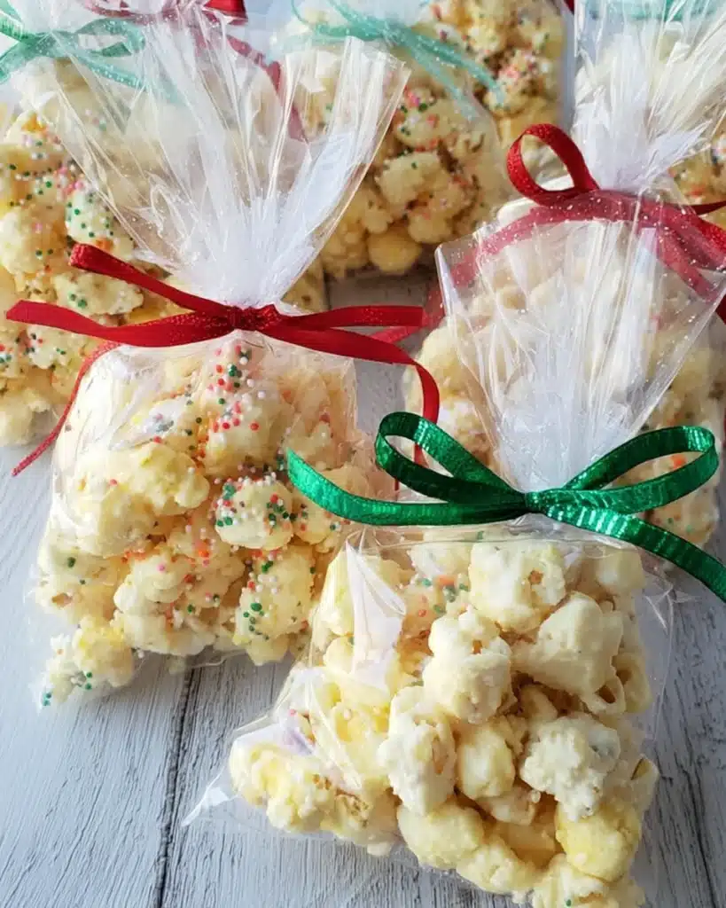 Puffcorn Christmas Munch (Festive Holiday Snack Mix) 1 Homemade Puffcorn Christmas Munch in festive gift bags with red and green ribbons
