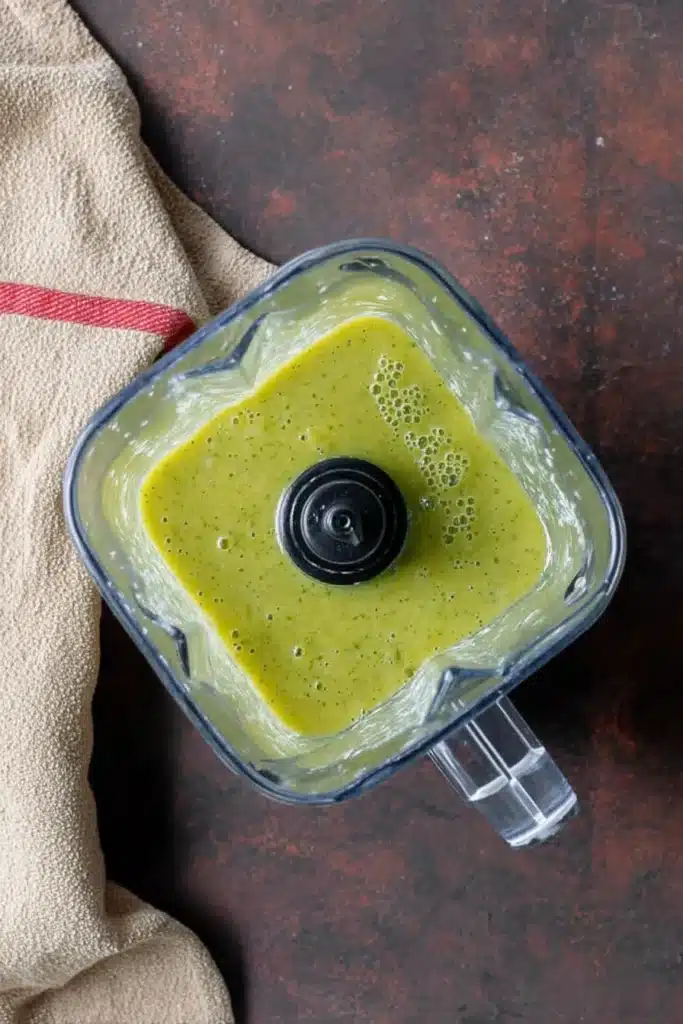 Chicken Pozole Verde 3 Blender with green tomatillo sauce for chicken pozole verde