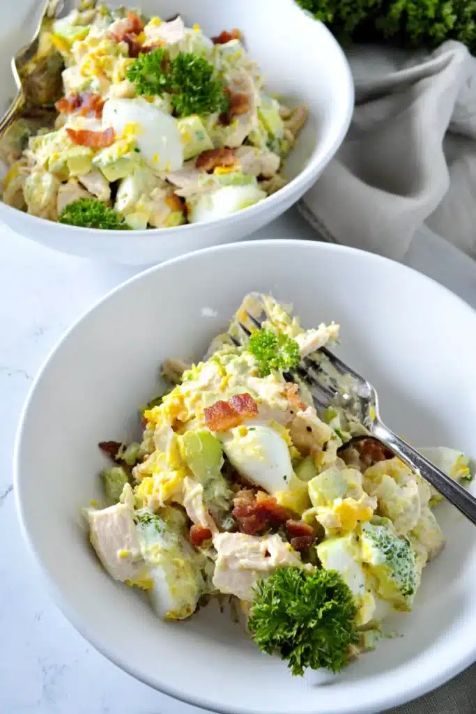 Low Carb Chicken Egg Salad (Easy Keto High-Protein Lunch Recipe) 4 Low carb chicken egg salad with avocado eggs and bacon served in a bowl