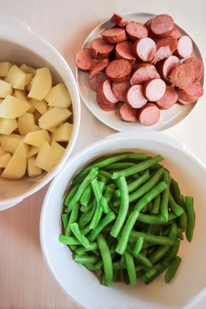 Crockpot Kielbasa and Green Beans 2 Crockpot Kielbasa and Green Beans ingredients prepped in bowls