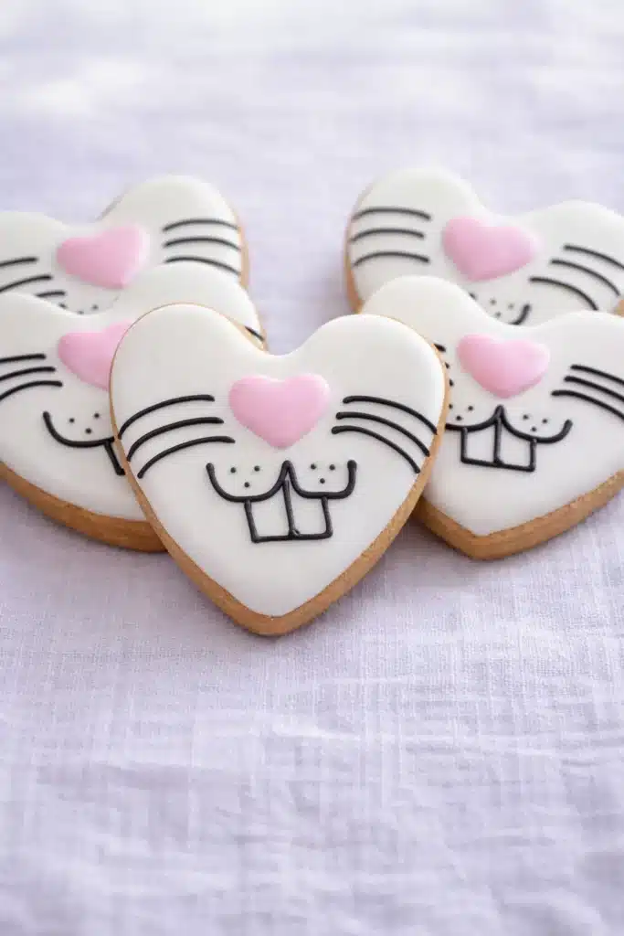 Easter Sugar Cookies decorated as bunny face heart cookies