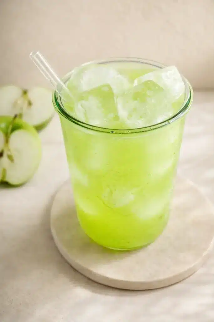 Green Apple Natures Gatorade served over ice in a glass jar