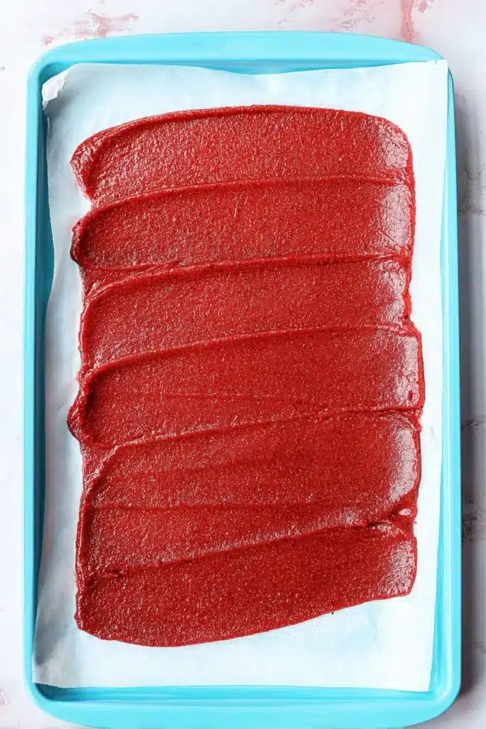 Strawberry Fruit Roll-Ups 2 Strawberry Fruit Roll-Ups puree spread evenly on a baking sheet