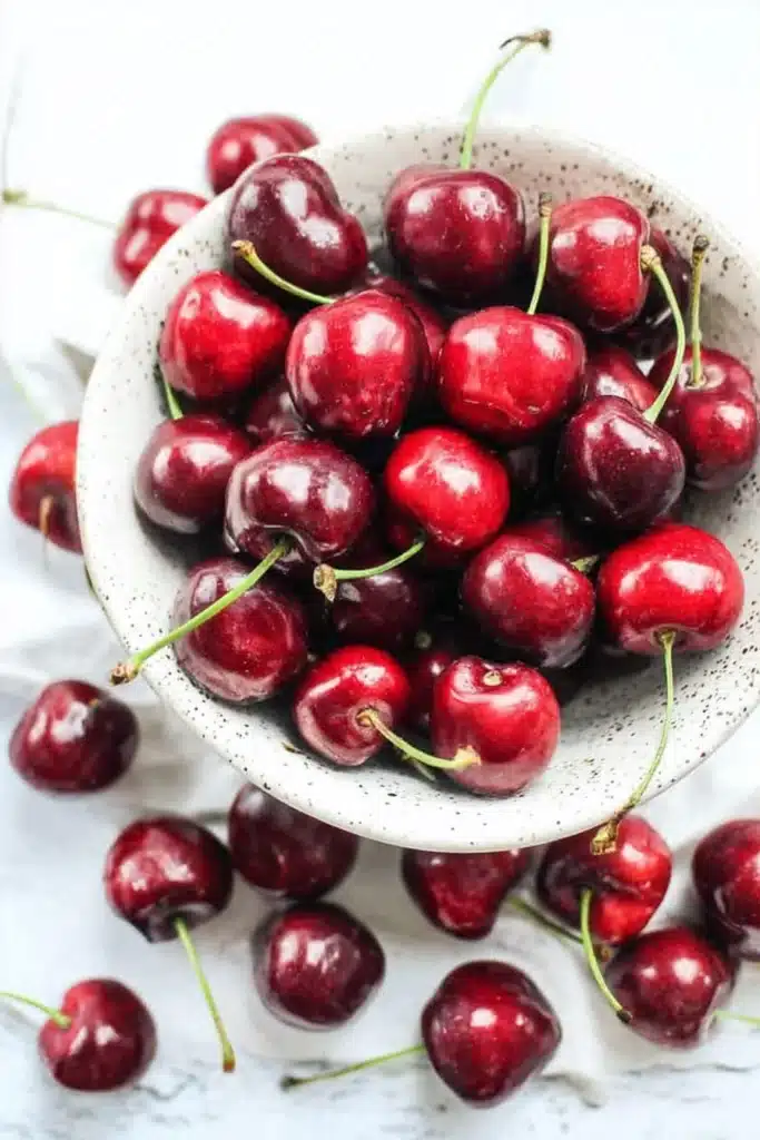 Cherry Walnut Couscous Salad 2 Fresh cherries for Cherry Walnut Couscous Salad in ceramic bowl