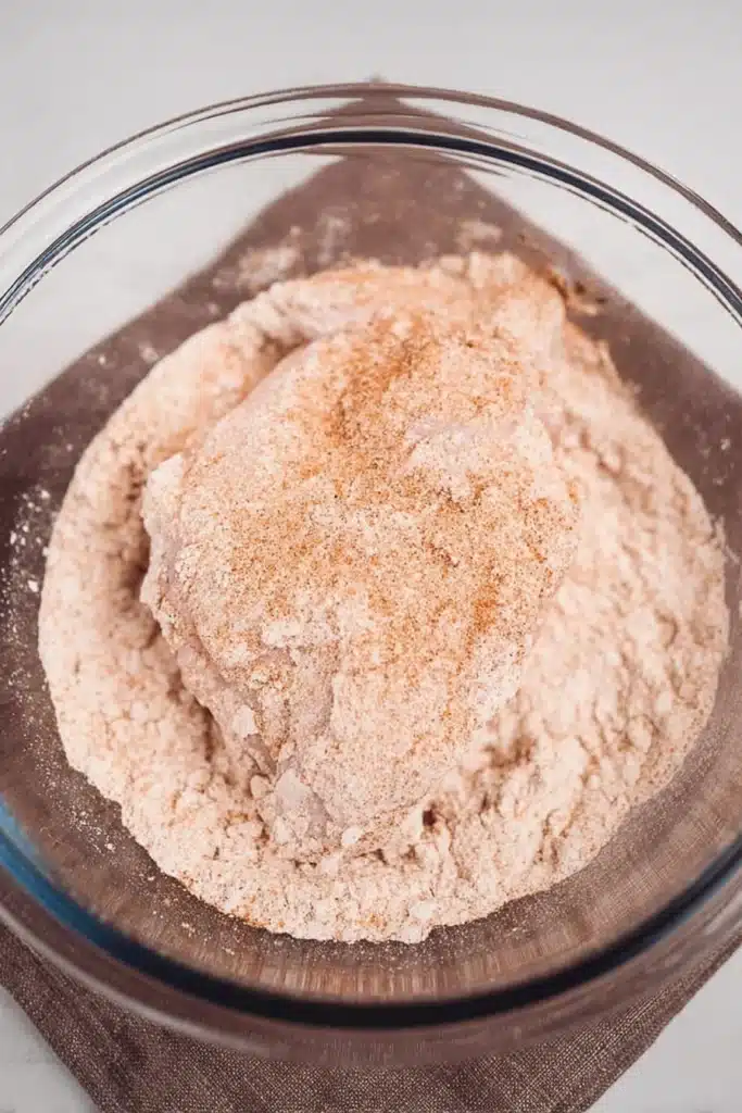 Chicken Paprikash chicken coated in seasoned flour before cooking