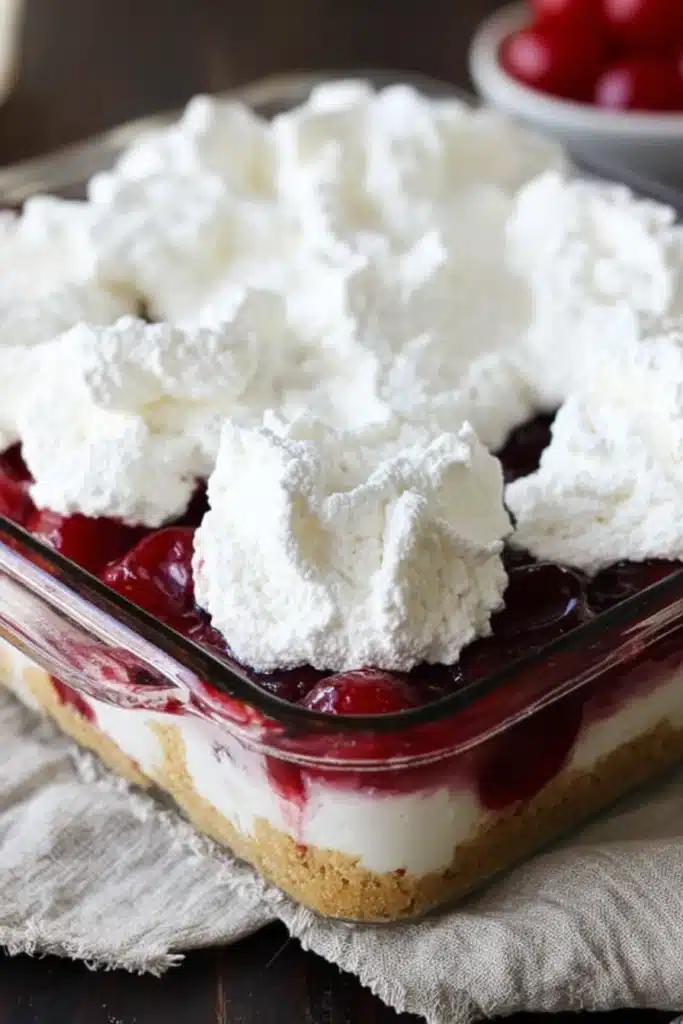 No-Bake Cherry Dessert That’s Creamy and Irresistible 3 Layering No-Bake Cherry Dessert with Whipped Cream