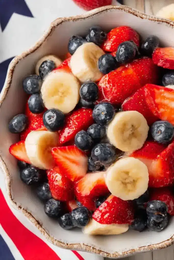 4th of July Fruit Salad close up with strawberries blueberries and bananas
