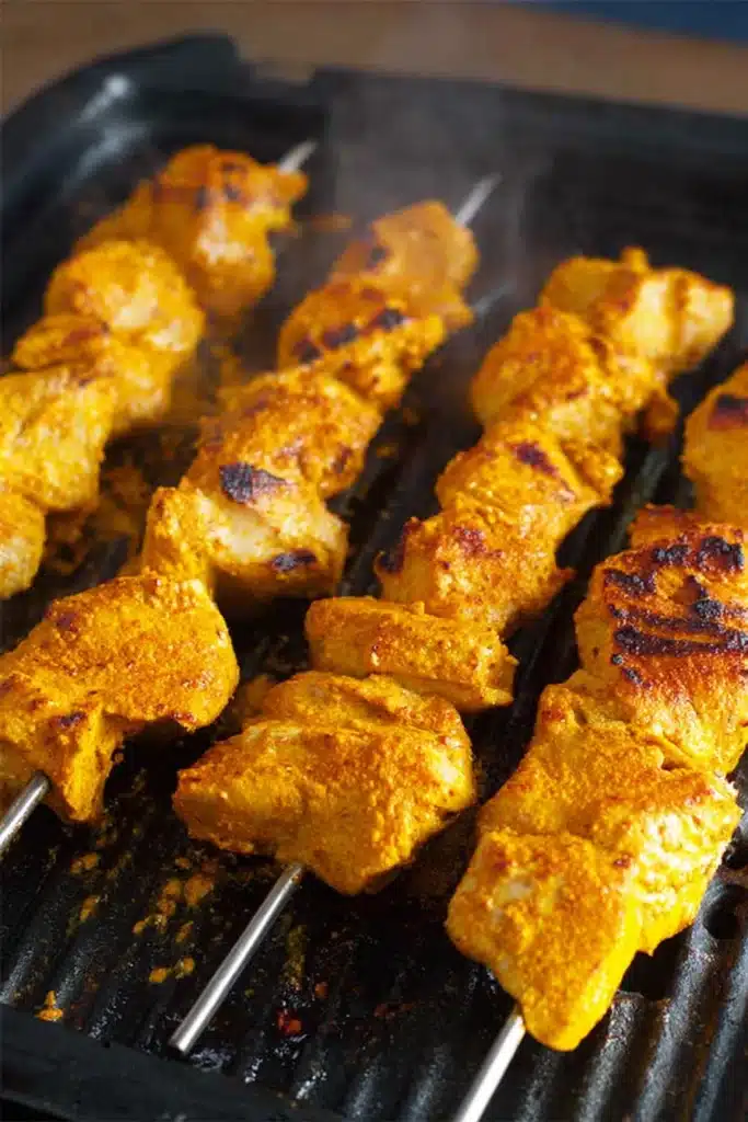 The Best Butter Chicken Recipe You’ll Ever Make at Home 2 The Best Butter Chicken grilled marinated chicken with charred edges
