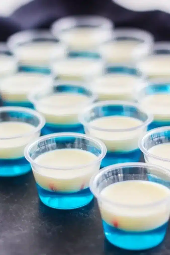 Red White & Blue Jello Shots 2 Red White & Blue Jello Shots with blue and white layers in clear cups