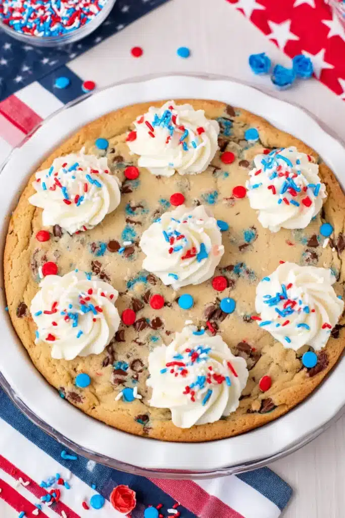 4th of July Cookie Cake with patriotic frosting and colorful sprinkles