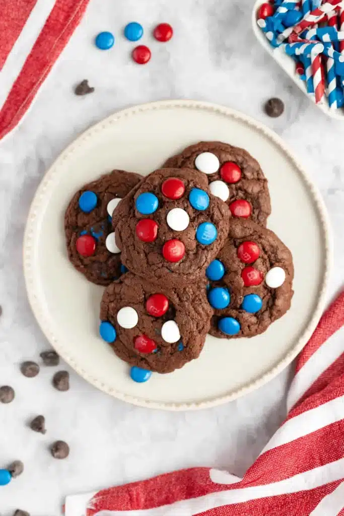 4th of July Cookies 4 4th of July Cookies on a white plate with patriotic candies
