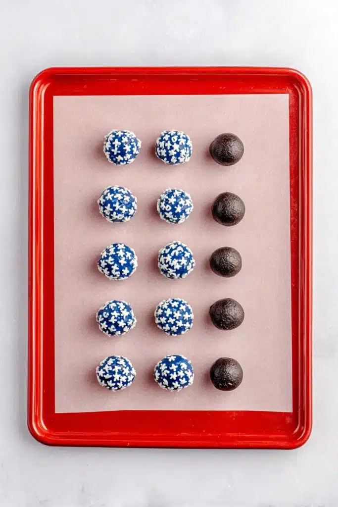 4th Of July Oreo Balls arranged on a baking tray before decorating
