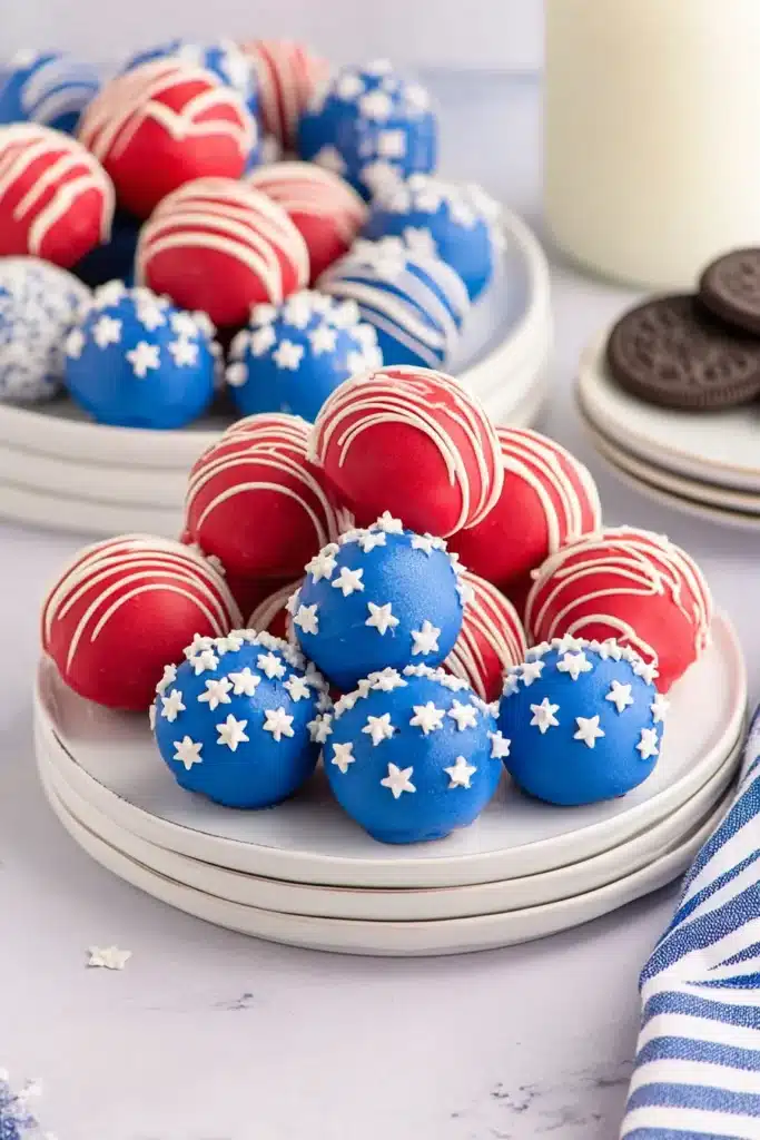 4th Of July Oreo Balls served on festive patriotic dessert plates