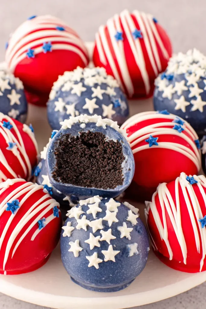 4th Of July Oreo Balls with red coating and blue patriotic sprinkles