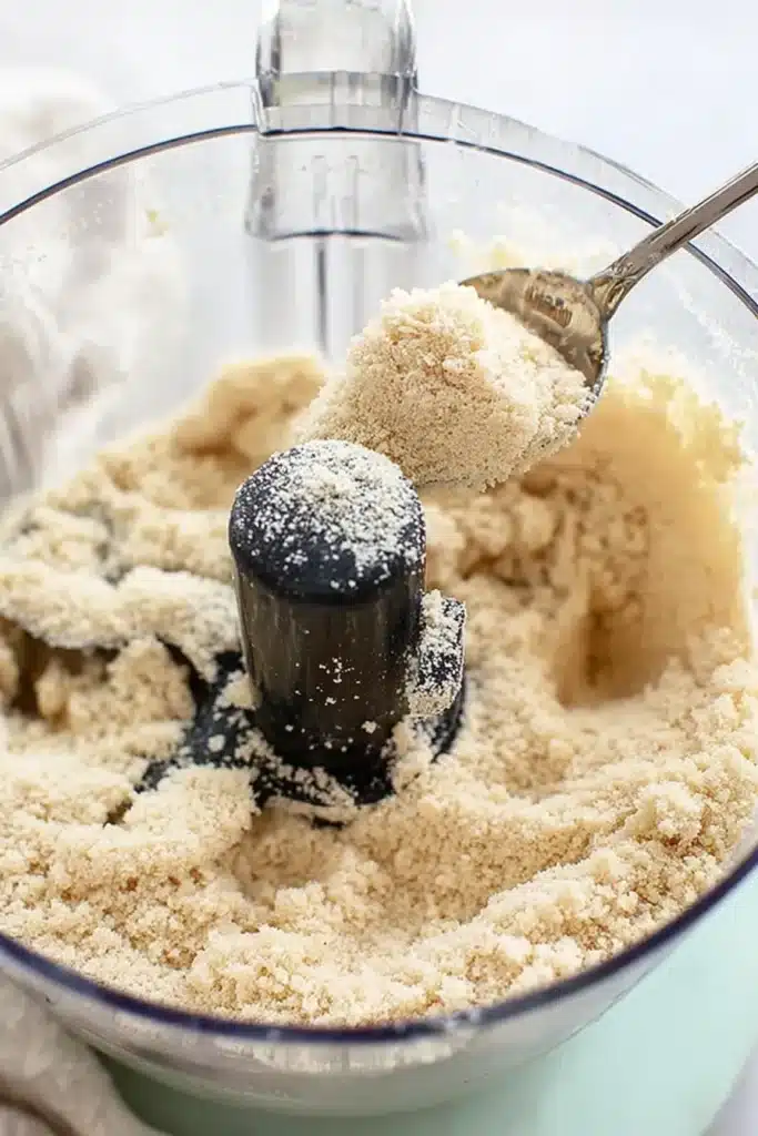Mango Crumb Bars buttery crumble mixture in food processor