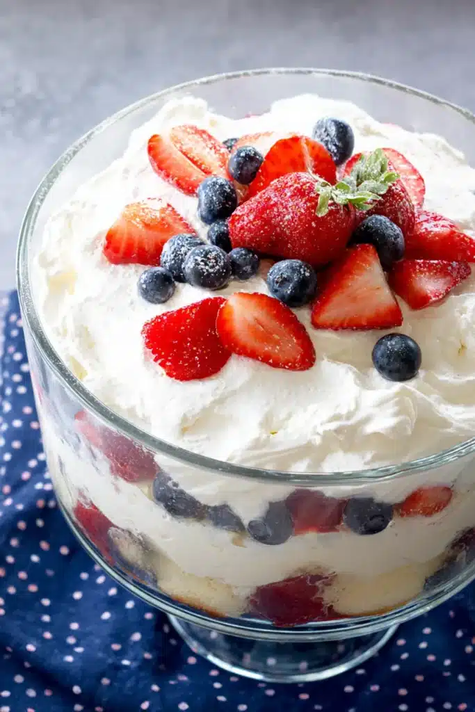 Patriotic Trifle Dessert 2 Patriotic Trifle Dessert topped with whipped cream strawberries and blueberries