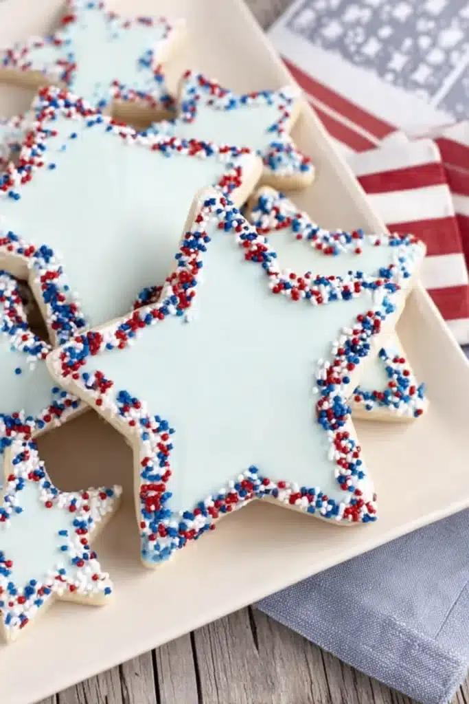 Star Cookies 1 Star Cookies cut into shapes on a parchment lined baking sheet