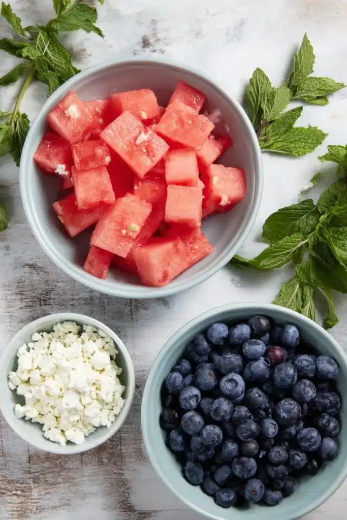 Watermelon Feta Blueberry Salad 2 Watermelon Feta Blueberry Salad ingredients with watermelon blueberries feta and mint