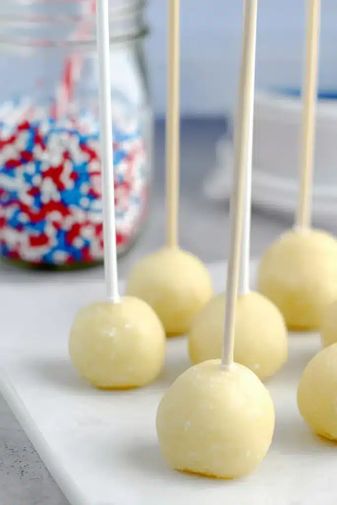 4th of July Cake Pops with sticks inserted before chilling