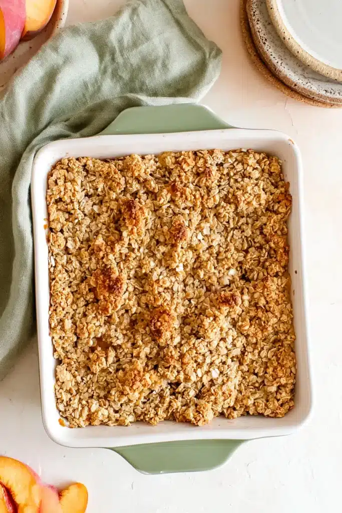 Peach Crisp Recipe 5 Freshly baked Peach Crisp with golden oat crumble topping