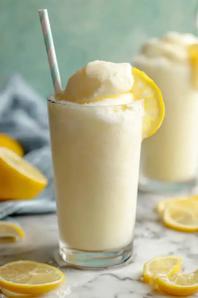 Chick-fil-A Frosted Lemonade 2 Chick-fil-A Frosted Lemonade copycat in a glass with lemon garnish