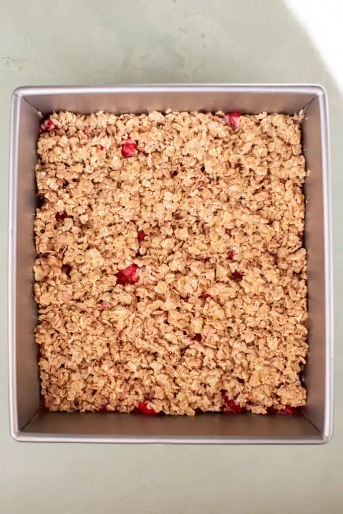 Healthy Strawberry Oatmeal Bars 4 Healthy Strawberry Oatmeal Bars assembled with oat crumble topping before baking