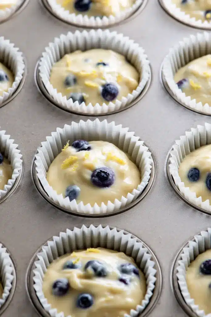 Lemon Blueberry Cupcakes batter in muffin liners before baking