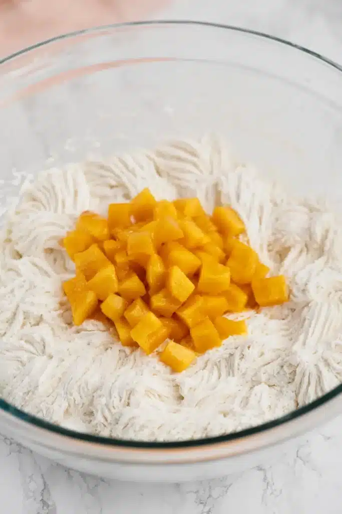 Peach Bellini Cupcakes 2 Peach Bellini Cupcakes batter with fresh diced peaches