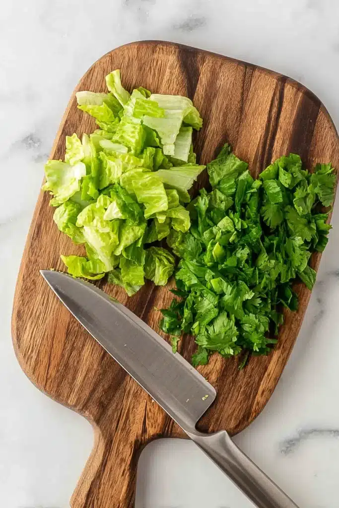 Southwest Salad Recipe 3 Fresh chopped romaine lettuce prepared for Southwest Salad on a cutting board