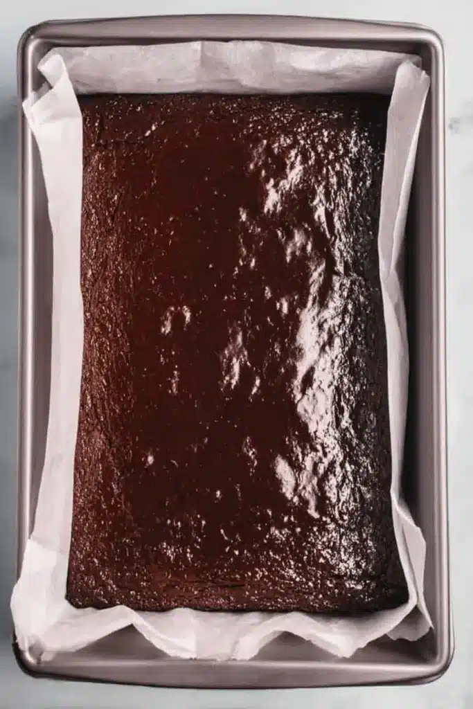 Star-Spangled Brownies baked in a parchment lined pan