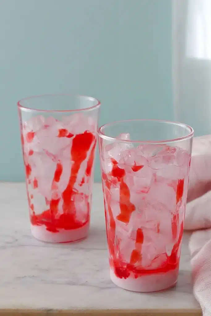 Coffee Creamer And Soda 2 Coffee Creamer And Soda with strawberry syrup and ice in glass
